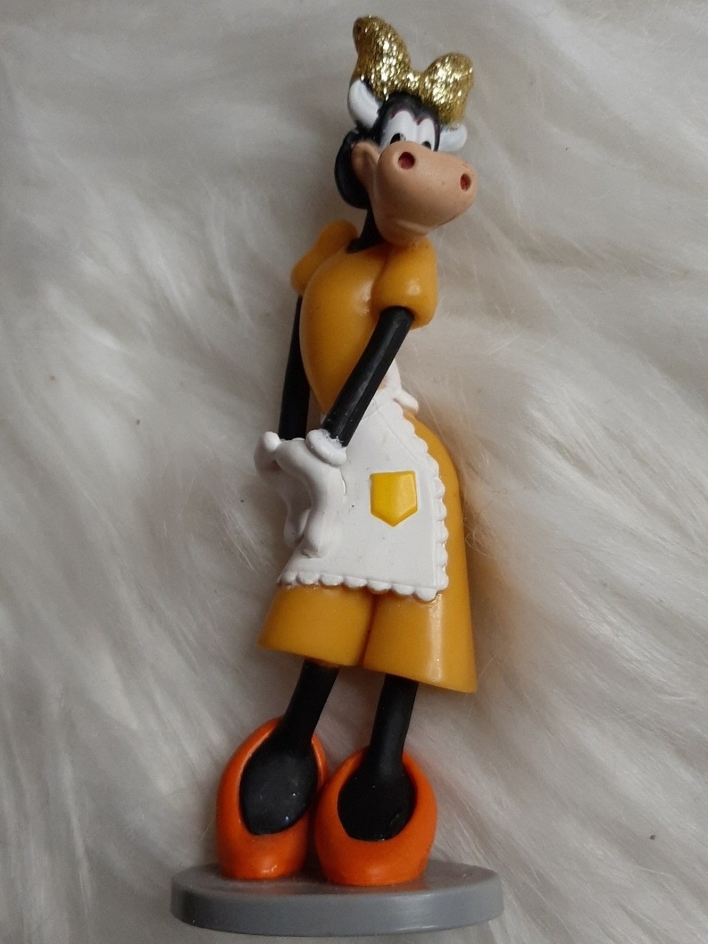 Disney Clarabelle Cow Figurine in Yellow Dress with Gold Glitter Bow